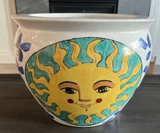 WBI Pottery Sunburst Design Flower Pot. 8”tall 10.5”wide.