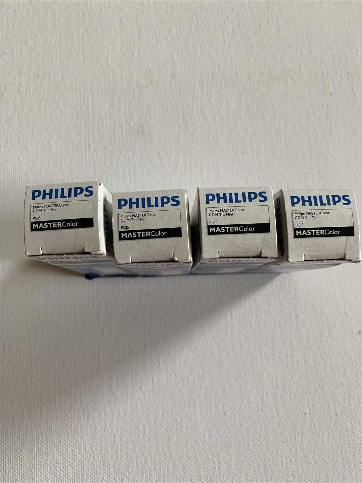 Philips MASTERcolour CDM-Tm Mini 20W/830 Lampada PGJ5 - Luce Bianca Calda, Classe A, Per Illuminazione Professionale - Foto 1