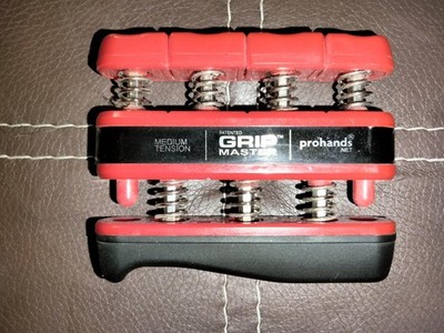 Prohands Grip Master - Medium Tension - RED - Hand Strengthen - Guitar Players