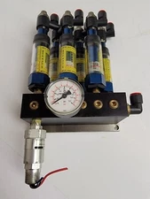 6 PORT STEEL MANIFOLD BLOCK W/ 6 HEDLAND FLOW METERS 271024 & PRESSURE SWITCH.