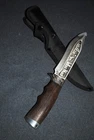 Vintage Wolf hunting knife. 65x13mm steel. Deep blade engraving.