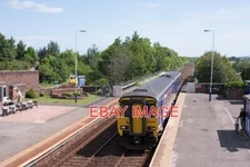 PHOTO  CLASS 156  UNIT 156438 STOPS IN WIGTON STATION WITH THE 10.54 PASSENGER S