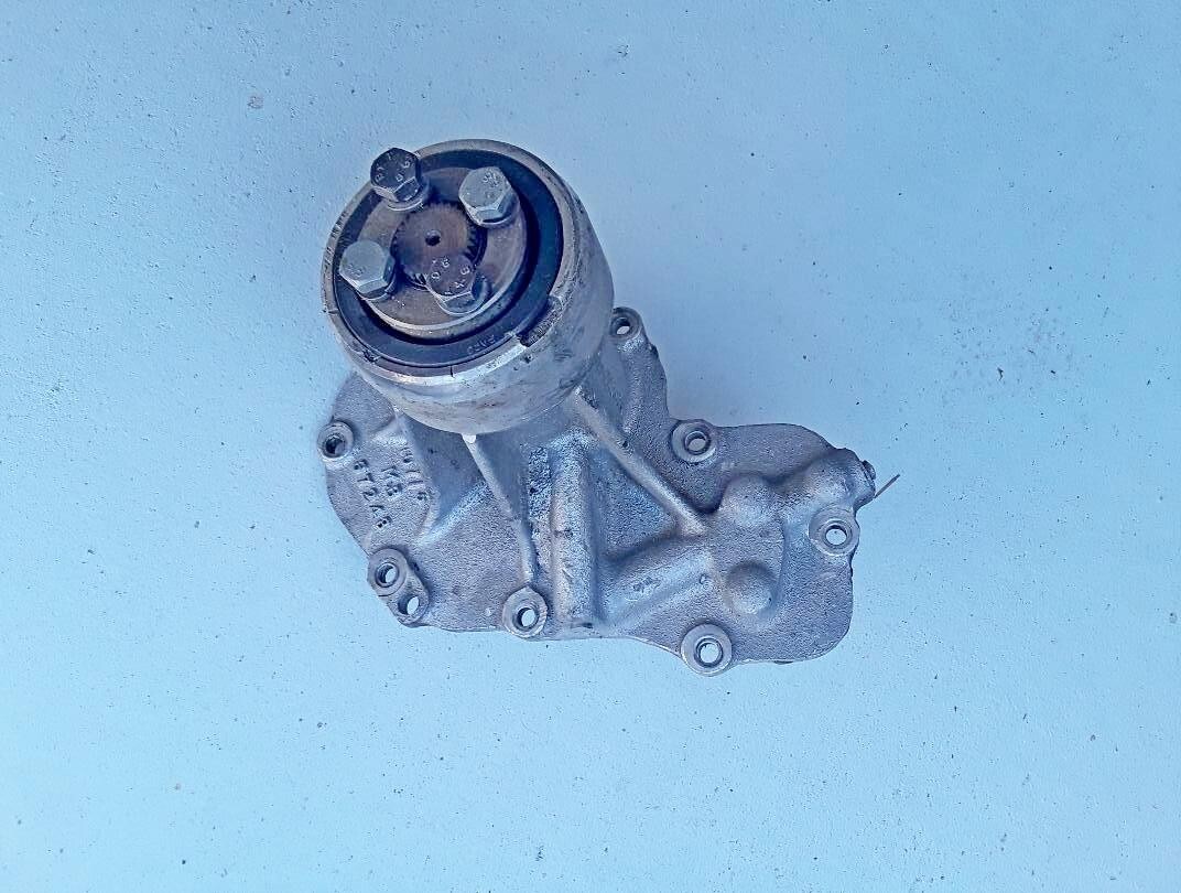 Maserati Indy front engine housing with cam chain tensioner and pulley driver
