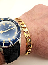 9ct Yellow Gold Flat Curb Link Bracelet. 8.5"/22cm, 8.5mm wide. 16.2g. 2550 c61