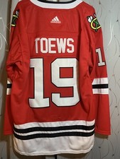 JONATHAN TOEWS CHICAGO BLACKHAWKS CAPTAIN HOME RED JERSEY LEGEND NHL HOCKEY STAR