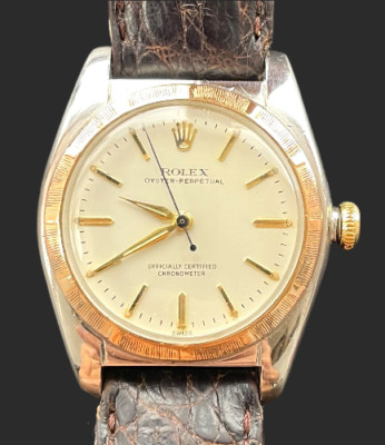 Rolex   Oyster Bubble Back 5011 Steel/Gold 14K 585 Automatic Chronometer 1948