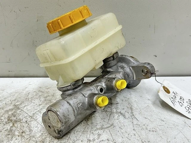 Cilindro maestro de freno Infiniti Q45 G50 HG50 1990 OEM pieza original 39384 2885 Foto 3 de 4