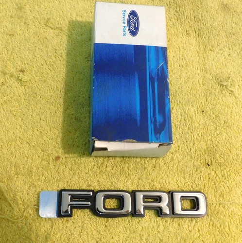 1979-1981 Ford Mustang NOS 'FORD' REAR TRUNK DOOR DECK LID EMBLEM NAME PLATE