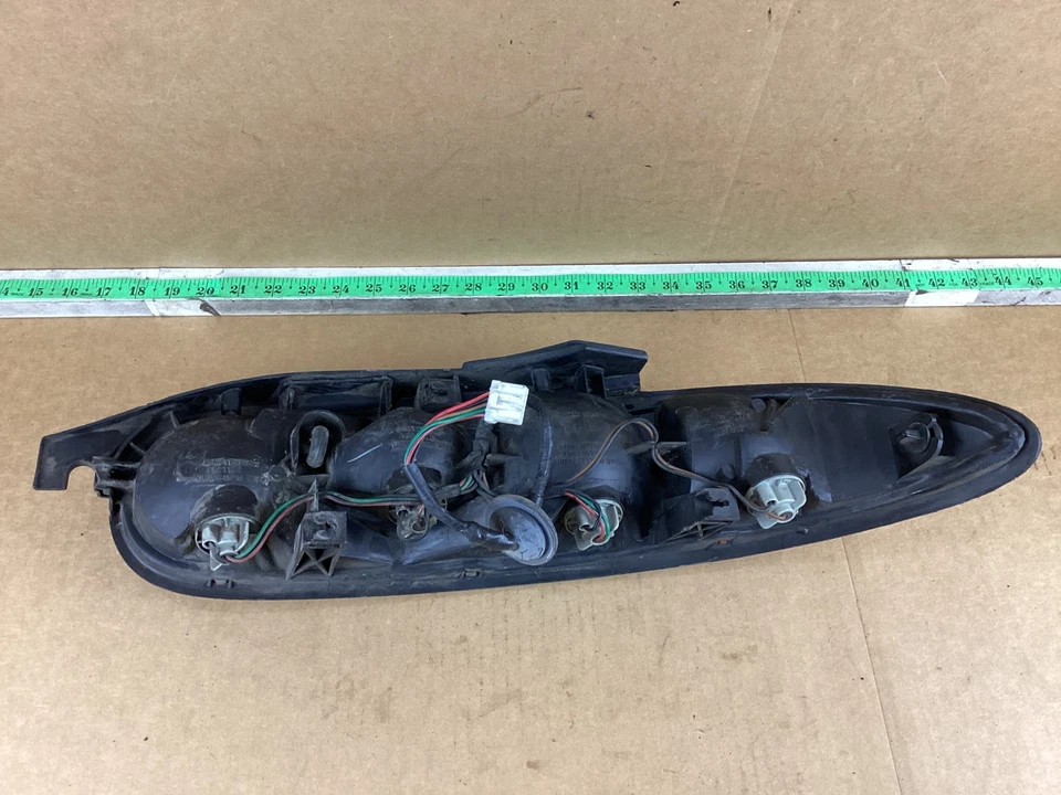 Luz trasera izquierda del lado del conductor Mazda MX3 1992-1996 166-58586 OEM Foto 4 de 4