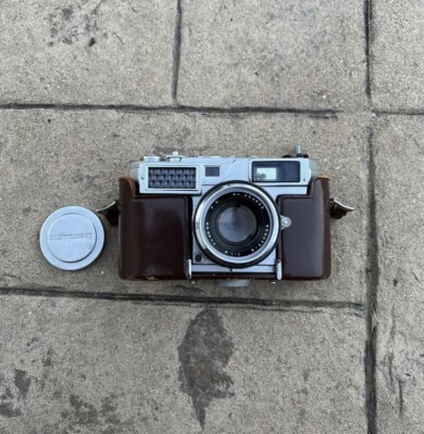 LIGHTOMATIC f=45mm RANGEFINDER ROLL FILM CAMERA