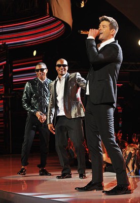 Recording artists Pharrell T I Robin Thicke perform onstage at the - Old Photo 2