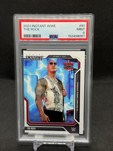The Rock 2024 Panini 9stant WWE No. 81 Bad Blood /100 PSA 9