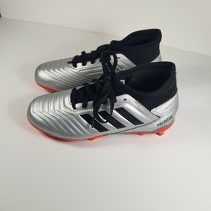 predator cleats youth