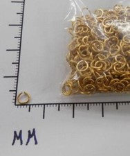 63540  Jump Rings 4mm Round Raw Brass / Jewelry Findings - 1 ounce SALE