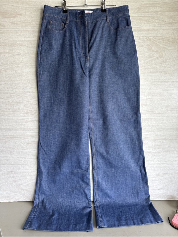 light-wash Carolina Herrera wide-leg jeans Sz 10 
