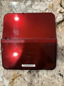 Nintendo New 3DS XL Red Handheld Console with Yo-Kai Watch 2 Game & Charger