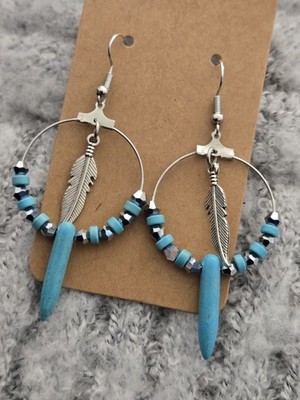 Native American Beaded Hoop Earrings With A Feather Charm And Turquoise Charm