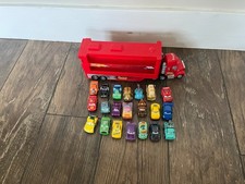 Disney Pixar Cars 21 Mini Racers Diecast & Mini Mack Truck Hauler DJ Dinosaurios