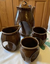 4 pieces Holkham Pottery 'Owl Eye' Coffee Pot with lid, 2 Mugs, Milk Jug, Brown.