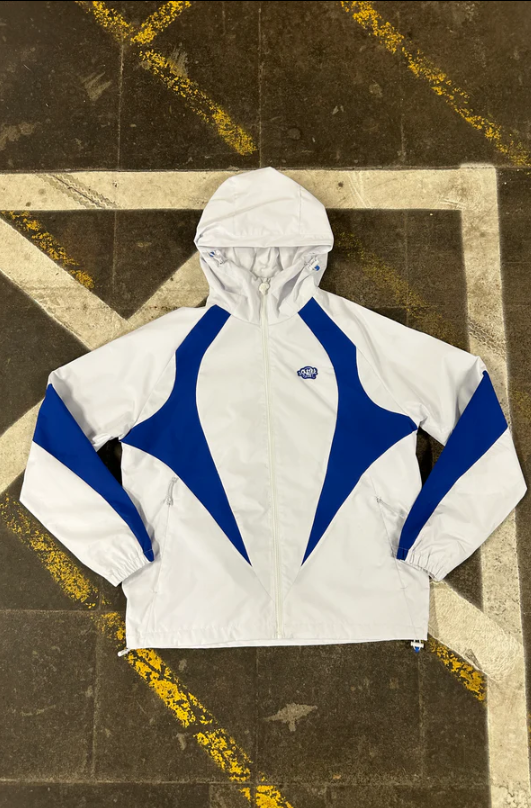 Syna world VORTEX WOVEN Windbreaker JACKET WHITE / BLUE - Next Day