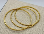 Three 22 Karat Gold Bangle Stacking Bracelets 26.6 Grams Yellow Gold — photo 1