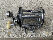 SUPER CLEAN PENN LEVELINE LEVEL WIND 350 REEL WITH ROD CLAMPS