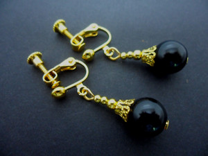 Authentic A PAIR OF BLACK ONYX GOLD PLATED DROP DANGLY CLIP ON EARRINGS. .
