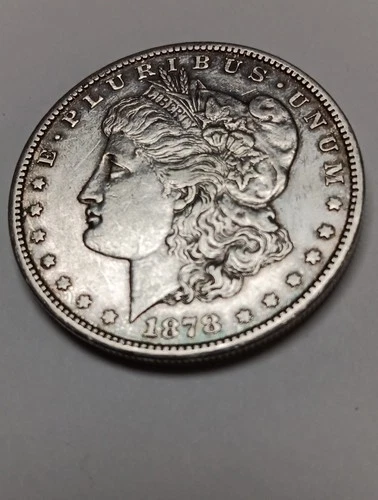 1878-CC Morgan Dollar Near Uncirculated,  Guaranteed Genuine.