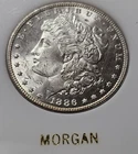 A 1886-P Choice/Gem BU Morgan Silver Dollar Old Holder. Beautiful!!!