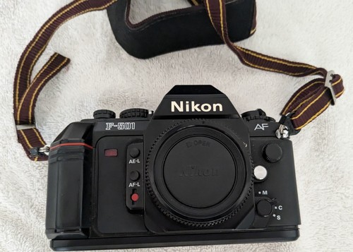 Nikon F-501 AF w/MF-19 Multi Data Back; Nikkor 50MM 1:18 lens; Flash Speedlight