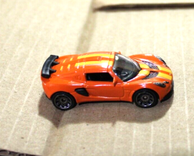 Matchbox '06 Lotus Exige Orange Yellow Strips | eBay