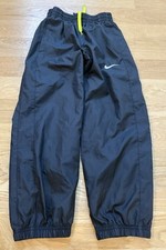Nike Wind Breaker Pants Boys Medium 8-10 Black Mesh Lined Swoosh Tapered Outdoor