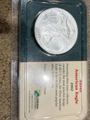 2002 Silver American Eagle Uncirculated and Blast White in Littleton Coin Pack