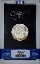1884-CC GSA TONED MORGAN SILVER DOLLAR~NGC GEM CERTIFIED MS66 WITH CARD AND BOX*