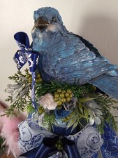 Blue bird Christmas tree topper with florals, ribbon_nesting bird tree top decor