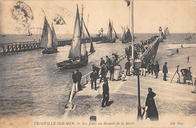 Old postcard 14 FOUVILLE SUR MER / LES JETEES AU MOMENT DE LA TAREE