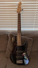 24% Off! Squier Cust 6 String Bass Guitar - $569.99