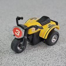 Vintage 1980’s Three Wheeler Coin Trike Kids Toy Pull Back Yellow