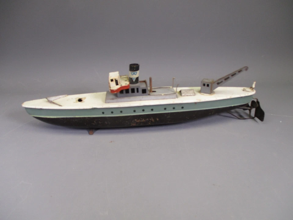 AB483 ARNOLD JOUET ANCIEN TOLE BATEAU DE MARCHANDISES 32 CM - Photo 1/4