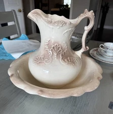 vintage or antique washbasin and pitcher, also known as a washstand set