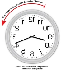 BACKWARDS REVERSE MIRRORED MIRROR WALL CLOCK - GREAT GIFT
