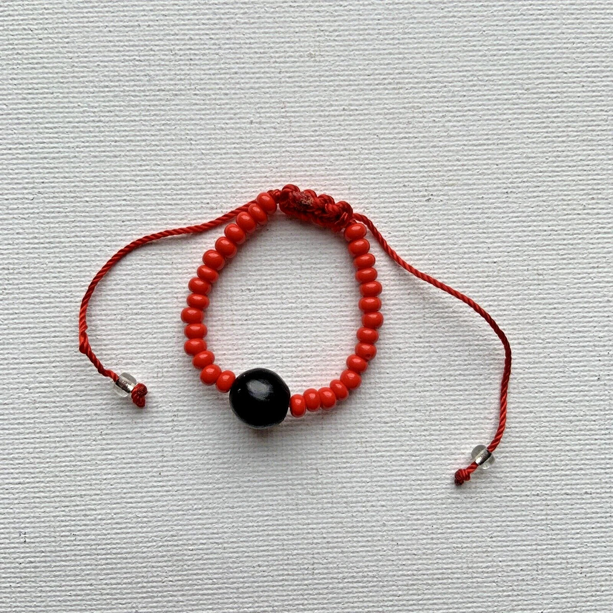 Red bracelet for mal clearance de ojo