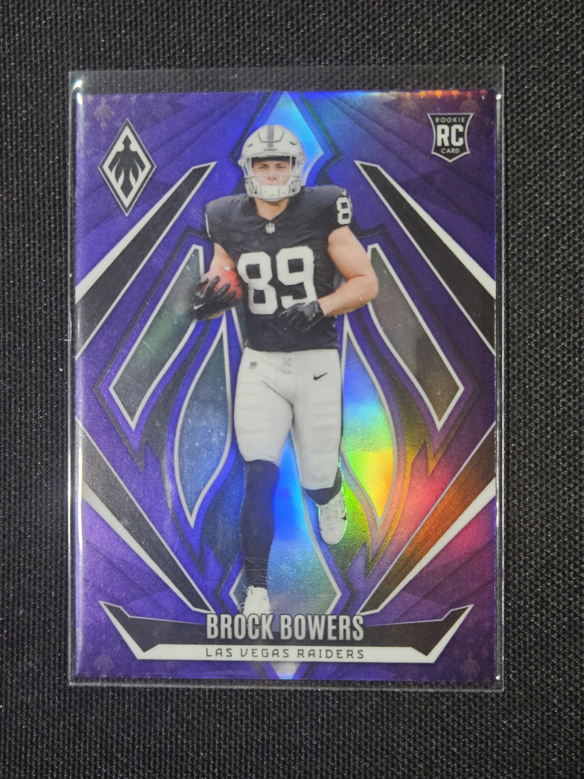 2024 Panini Phoenix - Rookies Brock Bowers #165 Purple (RC)