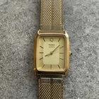 Vintage Timex Mens Tank Style Watch 26mm Gold Tone Case, Band And Dial A20