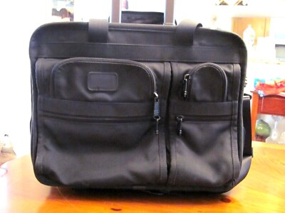 TUMI BLACK BALLISTIC NYLON 2 HANDLE 2 WHEELED ROLL OVERNIGHT