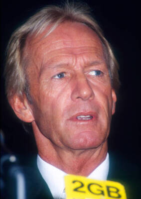 Australian actor Paul Hogan attends a press conference to promote - Old Photo 5