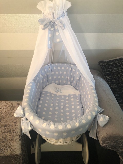 white wicker crib