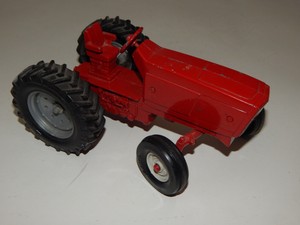 red metal tractor toy