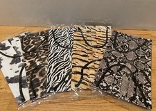 NWT Assorted Animal Print Face Masks set of 5, Individually wrapped.  Bonus 2