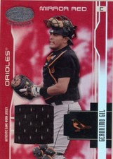 GERONIMO GIL 2003 LEAF CERTIFIED MATERIALS MIRROR RED JERSEY SP 57/250 ORIOLES